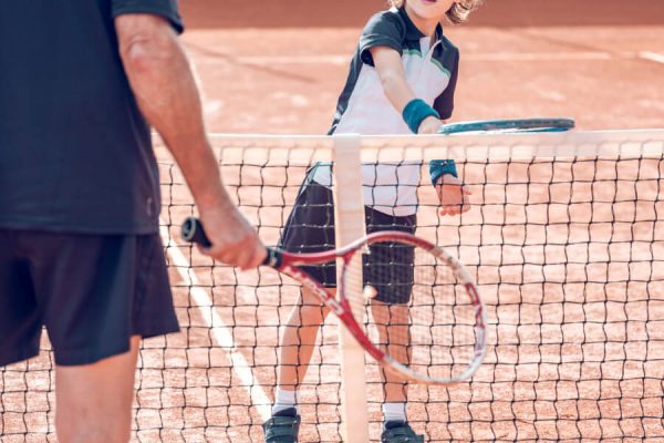 Active Little Boy Practicing Tennis With Crop Male 2022 02 03 23 30 10 Utc.jpg