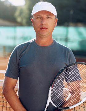 Middle Aged Man Tennis Player With Racket Standing 2021 09 03 12 46 25 Utc.jpg