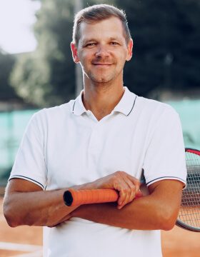 Portrait Of Positive Male Tennis Player With Racke 2021 09 03 13 00 10 Utc.jpg