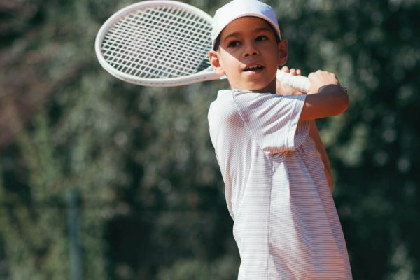 Tennis Instructor With Boy In Tennis Lesson 2021 08 26 16 54 04 Utc.jpg